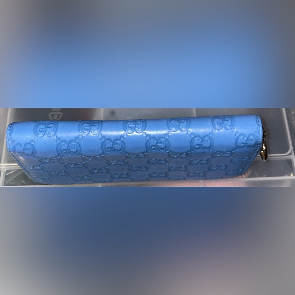 GUCCI SIGNATURE GUCCISIMA INTERLOCKING GG EMBOSSED BLUE LEATHER ZIPAROUND WALLET - Picture 15 of 16